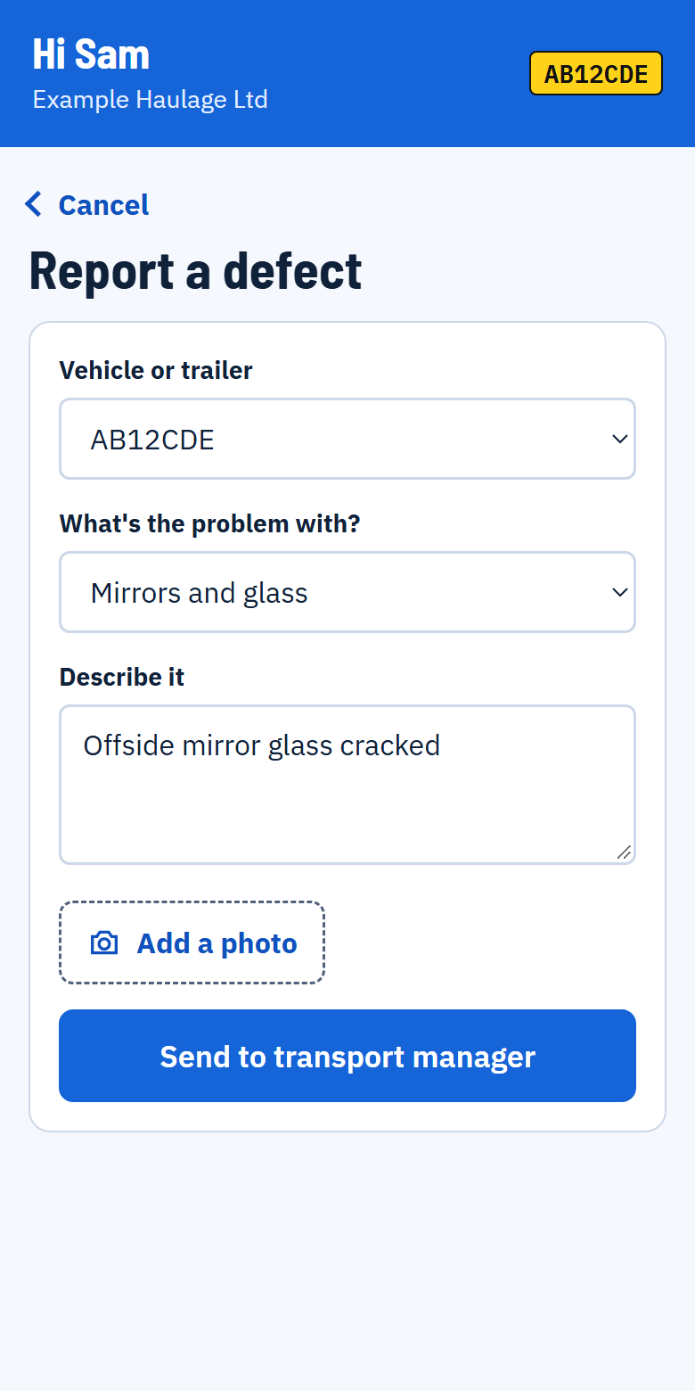 The Report a defect screen with the vehicle chosen, the problem set to Mirrors and glass, a description typed in, an Add a photo button and a Send to transport manager button.